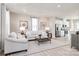 Spacious living room with light colored sofa and coffee table at 1805 Woodlands Pointe Dr, Charlotte, NC 28216