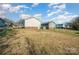 Backyard view showcasing a large open space and shed at 222 E Alabama Ave, Bessemer City, NC 28016