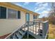 Home exterior with deck and stairs leading to the yard at 222 E Alabama Ave, Bessemer City, NC 28016