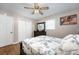 Bright bedroom with double bed, dresser, and ceiling fan at 222 E Alabama Ave, Bessemer City, NC 28016