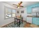 Bright dining area with glass table and built in corner at 222 E Alabama Ave, Bessemer City, NC 28016