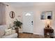 Living room with light walls, hardwood floors, and a comfy sofa at 222 E Alabama Ave, Bessemer City, NC 28016