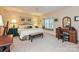 King-size bedroom with window seat and wood vanity at 232 Perrin Pl, Charlotte, NC 28207