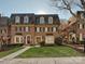 Brick front exterior of charming townhome with manicured lawn at 232 Perrin Pl, Charlotte, NC 28207