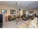 Bright living room featuring a comfy sofa and large windows at 232 Perrin Pl, Charlotte, NC 28207