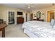 Main bedroom with built-in bookcases and a large TV at 232 Perrin Pl, Charlotte, NC 28207