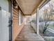 Wooden front porch with white railings and access to the front door at 3915 11Th Ne St, Hickory, NC 28601