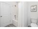 Clean bathroom with a bathtub shower combo at 5513 Skycrest Dr, Charlotte, NC 28269