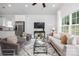 Open concept living room with modern furniture and a view of the kitchen at 5513 Skycrest Dr, Charlotte, NC 28269