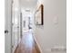 Bright hallway with hardwood floors and access to other rooms at 1070 Old Trade St, Edgemoor, SC 29712