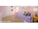 Cozy bedroom with a metal bed frame, side tables, and carpeted floors at 126 Rustling Waters Dr, Mooresville, NC 28117