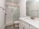 Bathroom with a glass enclosed shower, white subway tile, a vanity, and a white quartz countertop at 320 Triple Ponds Ct, Clover, SC 29710