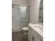 Modern bathroom featuring a glass-enclosed shower with subway tile and a vanity with a white countertop at 320 Triple Ponds Ct, Clover, SC 29710