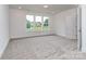 Bright bedroom with natural light, neutral walls and plush carpeting at 320 Triple Ponds Ct, Clover, SC 29710