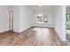 A cozy bedroom with wood flooring, white walls and natural light at 320 Triple Ponds Ct, Clover, SC 29710