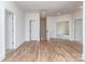 Bonus room with wood flooring, white trim, and multiple doorways at 320 Triple Ponds Ct, Clover, SC 29710