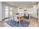 Open kitchen with pendant lighting, a center island, and a view of the dining room at 320 Triple Ponds Ct, Clover, SC 29710