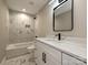 This bathroom features a shower over the tub, and a marble counter top at 409 Mint St, Rock Hill, SC 29730