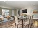 Stylishly staged living and dining area with modern furniture and decor at 409 Mint St, Rock Hill, SC 29730