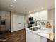 Modern kitchen featuring stainless steel appliances, white cabinetry, and an undermount sink at 409 Mint St, Rock Hill, SC 29730