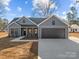 Gray house with a two-car garage and walkway at 635 E Ridge Rd, Salisbury, NC 28144