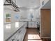 Kitchen island with granite countertop and modern light fixture at 635 E Ridge Rd, Salisbury, NC 28144