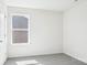 Bedroom with neutral carpet, light walls, and window providing natural light at 108 Rustling Waters Dr, Mooresville, NC 28117