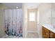 Bathroom with shower stall and floral shower curtain at 1274 Bicycle Ct, York, SC 29745