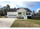 Charming one-story home with a white exterior, attached garage, and landscaped lawn at 1274 Bicycle Ct, York, SC 29745