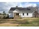 House back view, featuring solar panels and a deck at 1274 Bicycle Ct, York, SC 29745