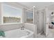 Elegant bathroom with soaking tub and walk-in shower at 188 Water Ski Dr, Statesville, NC 28677