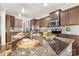 Kitchen with granite countertops and brown cabinets at 188 Water Ski Dr, Statesville, NC 28677