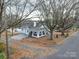 House with street view and surrounding neighborhood at 221 Palmer St, Albemarle, NC 28001