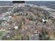 Wide aerial view of the property and downtown Albemarle at 221 Palmer St, Albemarle, NC 28001