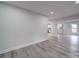 Open concept dining area with hardwood floors at 221 Palmer St, Albemarle, NC 28001