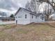 Side view of charming ranch home with mature trees at 221 Palmer St, Albemarle, NC 28001