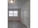 Bright bedroom with wood-look floors and neutral walls at 2996 Shady Ln, Charlotte, NC 28208