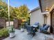 Small patio with seating area and fire pit at 3364 Northampton Dr, Charlotte, NC 28210