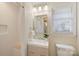 Updated bathroom with subway tile shower and modern vanity at 4017 Sulkirk Rd, Charlotte, NC 28210