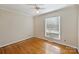 Bright bedroom with hardwood floors and window blinds at 4017 Sulkirk Rd, Charlotte, NC 28210