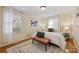 Spacious bedroom with hardwood floors and king-size bed at 4017 Sulkirk Rd, Charlotte, NC 28210