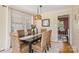 Dining room with a modern light fixture and neutral decor at 4017 Sulkirk Rd, Charlotte, NC 28210