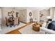 Dining area with a rustic table and wicker chairs at 4017 Sulkirk Rd, Charlotte, NC 28210