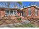 Brick front entrance with steps leading to the front door at 4017 Sulkirk Rd, Charlotte, NC 28210