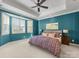 Spacious primary bedroom with bay window and ceiling fan at 500 Planters Way, Mount Holly, NC 28120