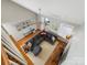 Living room view from above, showcasing sectional sofa and hardwood floors at 500 Planters Way, Mount Holly, NC 28120