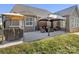 Patio with a grill, fire pit and seating area with two gazebos at 500 Planters Way, Mount Holly, NC 28120