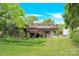 Backyard featuring a multi-level deck and green lawn at 9106 Nash Ave, Charlotte, NC 28213
