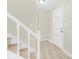 Entryway featuring modern luxury vinyl plank and staircase leading to the second floor at 9106 Nash Ave, Charlotte, NC 28213