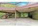 Covered patio area beneath the deck, providing shade and extra space at 9106 Nash Ave, Charlotte, NC 28213